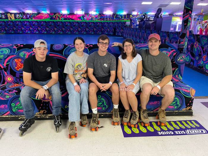 Adults enjoying skating together at a Valdosta roller rink