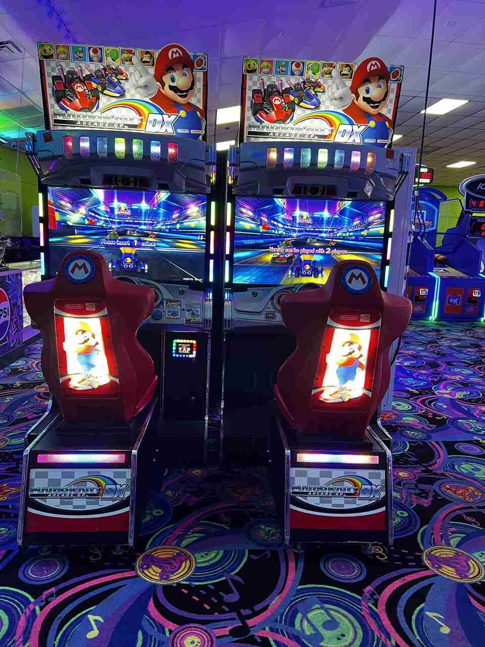 Kids enjoying arcade games in Valdosta instead of using their phones
