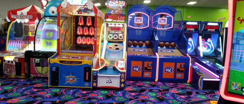 Teens enjoying competitive arcade games in Valdosta